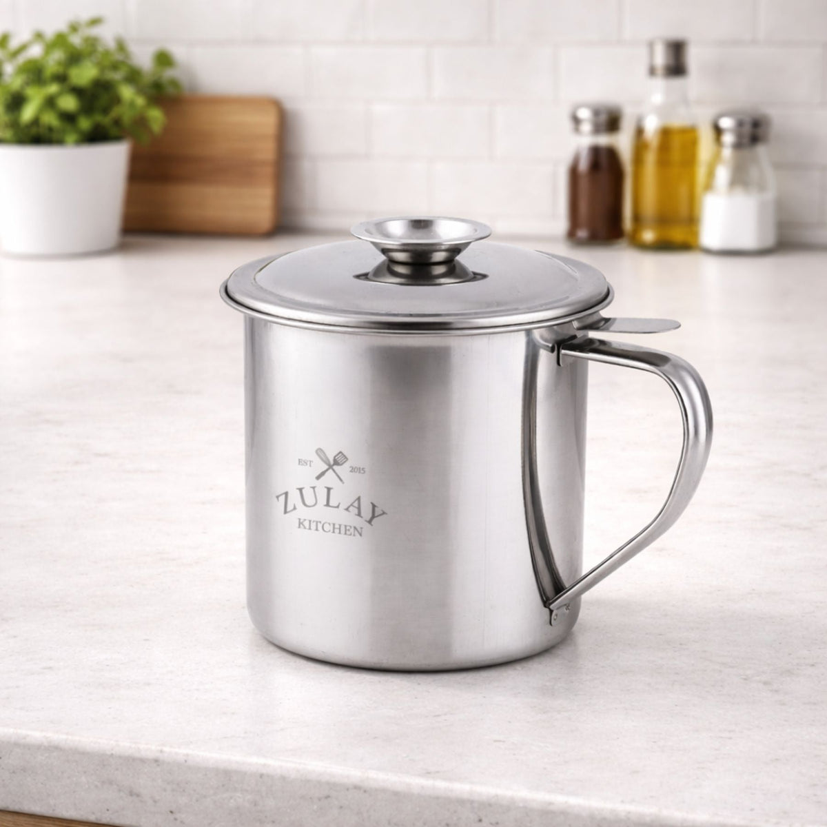 Zulay Kitchen Bacon Grease Container on a kitchen counter